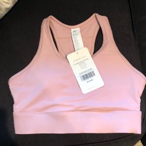 NWT. Fabletics sports bra! Light pink. Size xs.